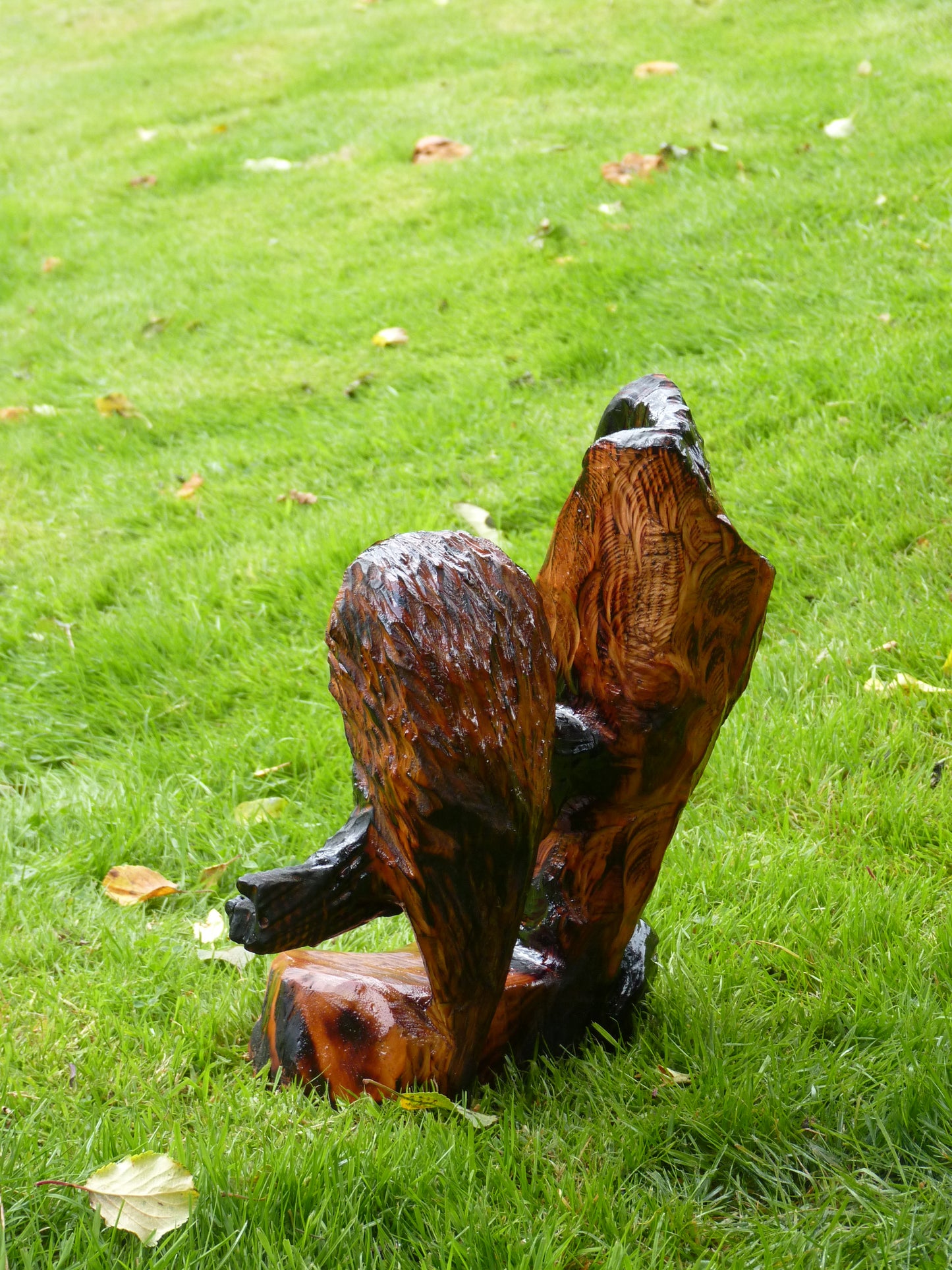 1 chainsaw carved owl on a branch