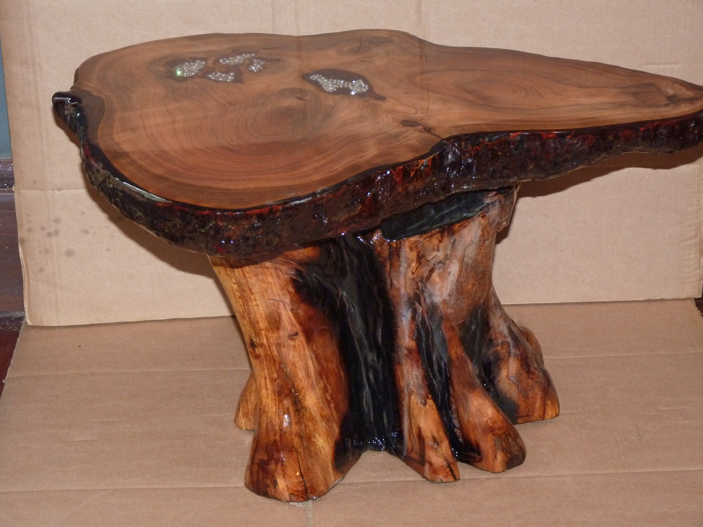 1 Resin table with Chainsaw carved base